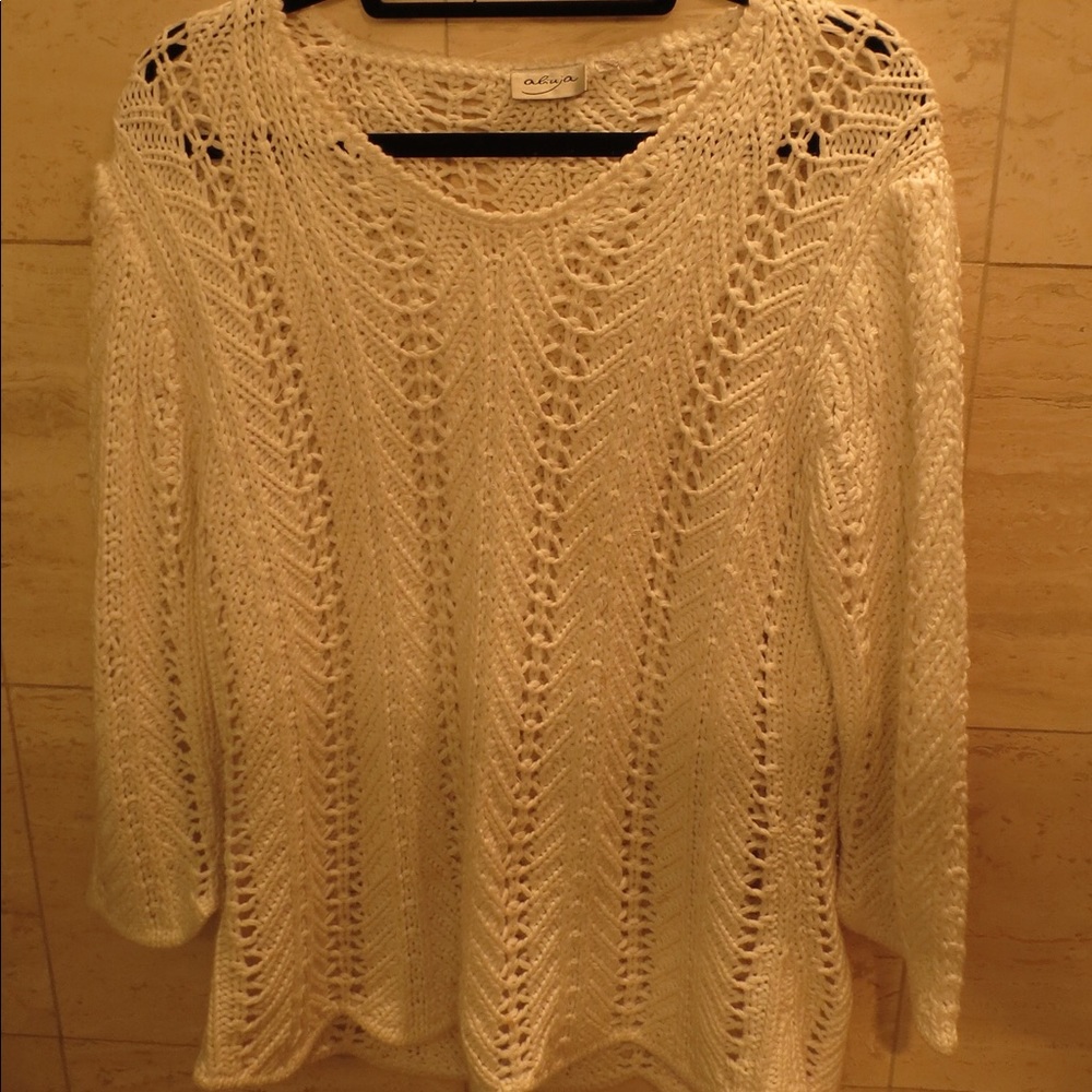 Hand knit sweater.